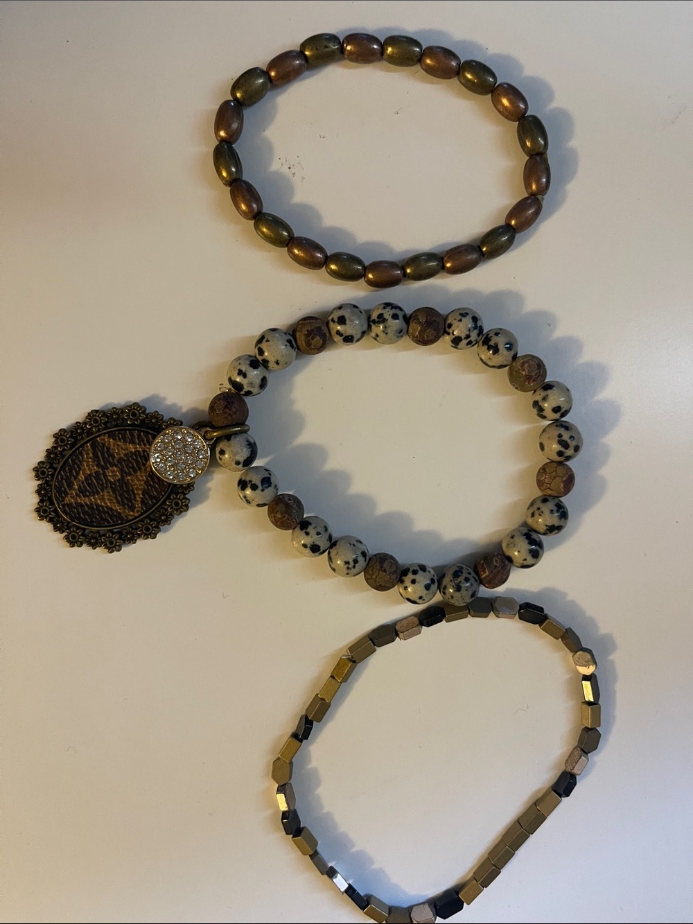 Louis Vuitton Brown, Cream & Gold Beaded Bracelet Stack